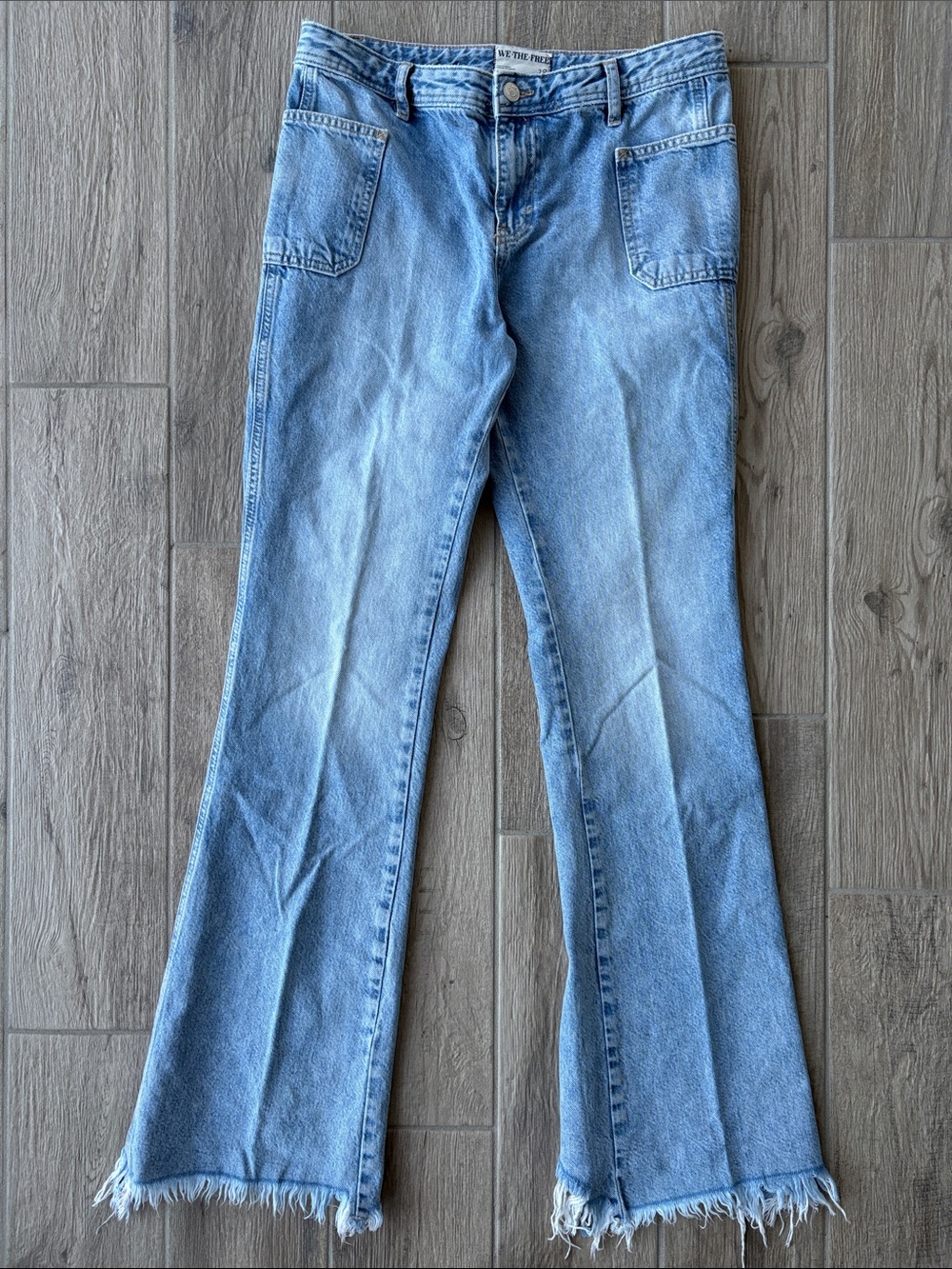 We The Free Light Blue Flare Jeans with Raw Frayed Hem Women’s Size 28
